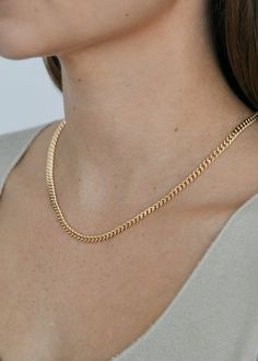 The Capri Curb Chain Collection is an absolutely timeless classic — then, now, always. Elevated with subtle detail in the chain, each necklace is made from a long chain, so each piece is one of a kind. 14k solid gold - always Weighs about 25 grams The chain is approximately 5mm thick Available in 16" or 18" We offer custom sizes upon request. Please add the Custom Size request to your cart from HERE. Custom sizes are final sale. Half sizes are final sale. Last photo shows Capri Curb Chain I and Classic Yellow Gold Cuban Link Necklace Tarnish Resistant, Classic Tarnish Resistant Yellow Gold Cuban Link Necklace, Classic Tarnish-resistant Yellow Gold Cuban Link Necklace, Classic Yellow Gold Cuban Link Necklace, Classic Curb Chain Jewelry For Everyday Luxury, Classic Figaro Chain Necklace For Everyday Luxury, Classic Cuban Link Necklace Tarnish Resistant For Everyday, Classic Cuban Link Necklace Gift, Tarnish Resistant, Classic Everyday Cuban Link Necklace, Tarnish Resistant