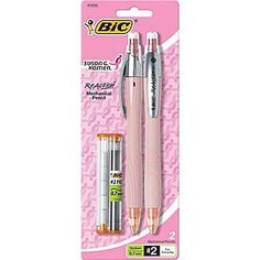 a pink pen and two pens in packaging