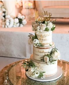 a wedding cake sitting on top of a table