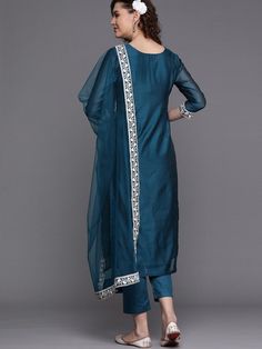 Buy enchanting teal embroidered kurta with pants and net dupatta. for women which is crafted from chanderi cotton fabric with beautiful trendy style and pattern. Embroidered Chanderi Palazzo Set, Designer Churidar With Embroidered Border, Chanderi Churidar With Sheer Dupatta And Straight Kurta, Cotton Silk Churidar With Sheer Dupatta And Straight Kurta, Chanderi Churidar With Zari Work, Embroidered Cotton Silk Churidar, Diwali Chanderi Lawn Suit, Diwali Churidar With Embroidered Border, Designer Unstitched Suit With Sheer Dupatta