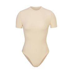 Like your favorite tee, but better! This molds-to-your-body short sleeve bodysuit features a buttery soft fabric, high crew neckline, and brief back for... Cheap Fitted Bodysuit With Funny Text, White Long Sleeves, Waist Shapers, Shirt Bodysuit, Neck Stretches, Bottoming Shirt, Short Sleeve Bodysuit, Crew Neckline, Soft Fabric