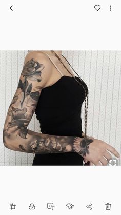 a woman with tattoos on her arms and arm is wearing a black dress, holding a chain