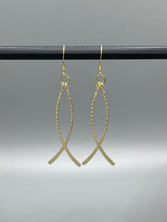 Elegant lightweight gold dangle earrings with slight sparkly texture, 18k gold ear hooks, hypoallergenic Gold Dangle Earrings With Fish Hook, Gold Hammered Drop Linear Earrings, Gold Drop Earrings With Fish Hook, Gold French Hook Earrings 14k Gold Filled, Minimalist Gold Hoop Earrings With French Hook, Gold Dangle Earrings With Lever Back, Gold Hammered Metal Linear Earrings, Elegant Gold Jewelry With Fish Hook, Gold Minimalist Linear Earrings With Lever Back