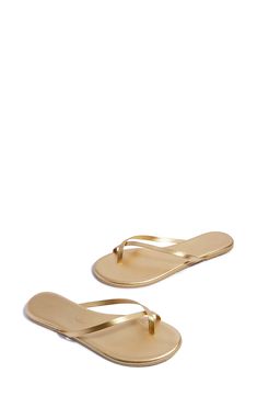 Shimmering metallic leather adds a luxe statement to this toe-loop flip-flop set on a lightweight, minimalist footbed serving all-day comfort. Water-resistant Leather upper and lining/rubber sole Made in Brazil Sleek Gold Sandals With Single Toe Strap, Sleek Gold Sandals For Summer, Gold Cushioned Flip Flops For Vacation, Sleek Metallic Sandals For Summer, Elegant Gold Flip Flops For Spring, Gold Leather Flat Flip Flops, Gold Cushioned Flip Flops For Spring, Modern Gold Sandals For The Beach, Elegant Gold Toe Post Flip Flops