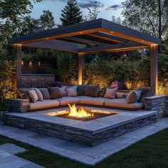 an outdoor living area with fire pit, seating and pergolated gazebo at dusk