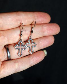 ♥ 10% off when you buy two pairs of earrings. Use code 10OFFTWO at checkout. ♥ Lovely, simple and delicate Silver Cross Earrings, Holy Cross Antique Silver Earrings. Hollow Cross is 1.5 cm (15 mm) wide by 1.8 cm (1.8 mm) length.  The Ear Hooks are silver plated. Crosses are silver toned. Ear Studs and Clip On's in silver tone only.  Please see photo for details.  Thank you for looking! Silver Cross Earrings, Antique Silver Earrings, Holy Cross, Christian Cross, Earring Display, Cross Earrings, Cross Jewelry, Silver Cross, Pierced Ears