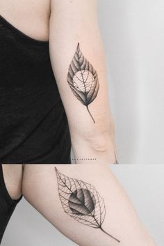 a woman's left arm with a leaf tattoo on it