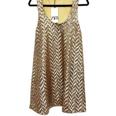 This Zara Sequin Mini Dress Is Brand New With Tags And Is The Perfection Of Sequin And Sparkles! The Color Is A Rich Champagne Gold. Size Small But Definitely Runs Oversized. Gold Sleeveless Dress For Summer Nights, Sleeveless Casual Mini Dress For Party Season, Casual Sleeveless Mini Dress For Party Season, Zara Sleeveless Dresses For Party Season, Gold Sleeveless Mini Dress For Spring, Gold Sleeveless Mini Dress For Summer, Sleeveless Zara Dresses For Party Season, Sleeveless Gold Mini Dress For Summer, Zara Summer Party Tank Top