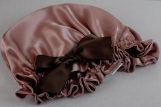 "Luxurious 19mm Mulberry Silk Charmeuse Sleep Bonnet. Excellent for protecting your hair at night from tangles and drying out. A bonnet locks in moisture while the natural properties of silk allow it to remain breathable. This original bonnet (Copyright 2013, Adorabellababy) designed by Adorabella Designs is gaining national attention. In the Fall of 2013, AD was asked to participate in a gifting event for the American Music Award Nominees! Silk is VERY beneficial to your hair and skin. It does Adjustable Pink Bonnet As Gift, Elegant Adjustable Pink Bonnet, Silk Sleep Bonnet, Hair At Night, Sleep Bonnet, Brown Satin, Night Cap, American Music Awards, Wild Rose