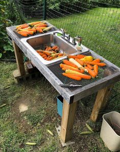 there are carrots being cooked on the grill in the yard by someone's house