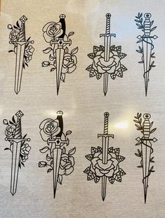 an assortment of tattoo designs on a sheet of paper