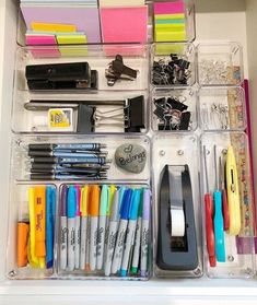 a drawer filled with lots of office supplies