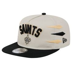 the new orleans saints snap back hat is white and black