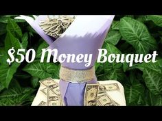 a purple hat with money on it and the words $ 50 money bouquet above it