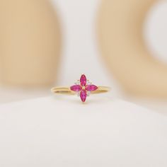 Your Ruby Engagement Ring is stylish, dainty and pretty ideal for everyday use. Details of solid gold handmade Flower Shape Ruby Ring are very eye-catching. It is a great gift for your loved ones. This jewelry will be an indispensable piece of yours. This meaningful Dainty Ruby Ring with high quality handwork will be a legacy you can leave to your family its.  * Vintage Style Ruby Ring Details * Material / Gold Kt:  14K (585), 18K (750), 8K (333) * Available Gold Colors: Yellow Gold, White Gold, Gift 14k Gold Flower Ring With Gemstones, 14k Gold Flower Ring With Gemstone For Gift, Yellow Gold Flower Ring Gemstone Gift, 14k Gold Flower Ring With Gemstones As A Gift, Yellow Gold Flower Ring With Gemstone For Gift, Gold Marquise Ruby Ring For Gift, Flower Shaped Gemstone Ring For Gift, Dainty Flower Shape Gemstone Rings, Dainty Marquise Ring For Gift