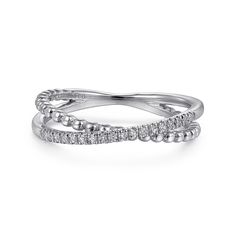 two white gold wedding bands with diamonds on each band, set in 18k white gold