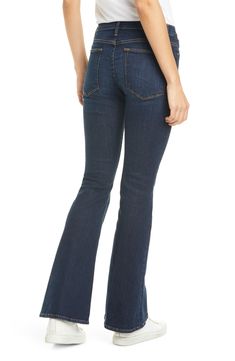 An exaggerated flare cut adds undeniable retro attitude to these street-chic stretch-denim jeans. A FRAME introduction to the bestselling palazzo silhouette, this pair is designed in petite sizing with a comfortable high waist, fitted hip and lived-in feel upon first wear. 28 1/2" inseam; 22" leg opening; 10" front rise; 12 1/2" back rise (size 29) 93% cotton, 5% polyester, 2% elastane Machine wash, tumble dry Made in the USA of imported fabric Trendy Dark Wash Flared Hem Flares, Trendy Dark Wash Flares With Flared Hem, Retro Mid-rise Stretch Flares, Chic Dark Wash Stretch Flare Jeans, Chic Stretch Dark Wash Flare Jeans, Chic Stretch Flare Jeans In Dark Wash, Denim Flares With Flared Hem, Trendy Stretch Flare Jeans With Standard Leg, Chic Stretch Flare Jeans