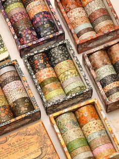 many different types of washi tapes in boxes