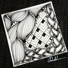 a black and white drawing of an intricate design