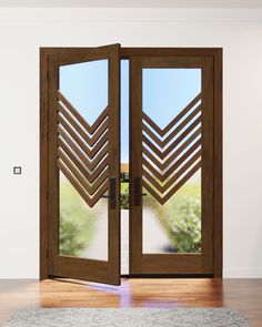 an open wooden door with glass panels on the inside and outside, in front of a white wall