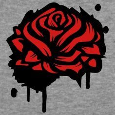 a red rose is splattered on the side of a t - shirt with black ink