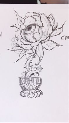 a drawing of a flower with an eyeball in it's center and coffee cup on the bottom