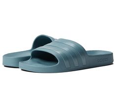 adidas Adilette Aqua Slides - Athletic Shoes : Magic Grey/Magic Grey Metallic/Magic Grey : adidas Adilette Aqua Slides feature a classic slip-on style slide with three stripes. Synthetic upper. Synthetic lining and insole. Synthetic outsole. Imported. Measurements: Weight: 4 oz Product measurements were taken using size Men's 8, Women's 9, width Medium. Please note that measurements may vary by size. Weight of footwear is based on a single item, not a pair. Adidas Slides For Swimming With Logo, Adidas Slides With Logo For Swimming, Adidas Slides With Branded Insole, Comfortable Adidas Slip-on Slides, Casual Adidas Slides For Swimming, Adidas Slip-resistant Slip-on Slides, Adidas Slip-on Slides, Adidas Sports Slides With Rubber Sole, Adidas Sporty Slides With Rubber Sole