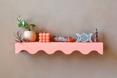 a shelf that has some decorations on it