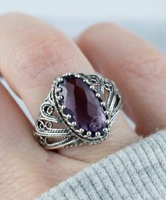 On the prowl for a wacky piece of jewelry that says I-don't-care? Look no further than Filigranist's variety of quirky ring! This 925 sterling silver filigree art amethyst gemstone women cocktail ring is the epitome of style. Made from high quality materials, this ring has been designed to last for many years. In fact, you can even treat it like your own personal memento by adding it to your jewelry box. With its unique design and stunning colors, this purple stone ring is sure to attract everyo Quirky Ring, Metal Embroidery, Angel Design, Art Angel, Silver Cocktail, Filigree Jewelry, Sterling Silver Filigree, Filigree Design, Velvet Pouch