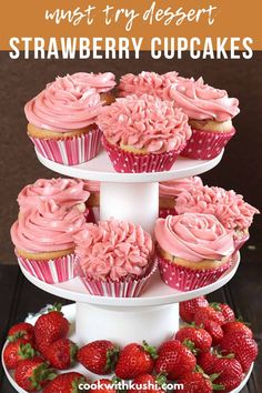 strawberry cupcakes are stacked on top of each other