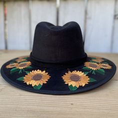 Bota Exotica - Felt Hats for Women / Felt Hats for Women

 The price includes sales tax and shipping cost within the United States / The price includes sales tax and shipping cost within the United States

 Women's Felt Hat Description: Western felt hats for women from Stone Hats. Beautiful black felt material on the crown of the hat with embroidered sunflowers surrounding the brim. Made 100% in Mexico.

 Description of the Felt Hat for Women: Felt hat for women from Stone Hats. Beautiful black Felt Hats For Women, Embroidered Sunflowers, Felt Hats, Felt Material, Hat For Women, Black Felt, Local Government, Black Hat, Felt Hat