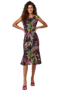 Tropical Print Fluted Lace Dress from Roman. Lace it up in this knee length tropical print dress, suitable for any occasion you have this season. This bold vibrant print features a luxe lace material with a round neckline and grown on sleeves that offers a frill hem for a flirty feminine look. Sharpen up this style with a clutch and bold coloured heels. Coloured Heels, Tropical Print Dress, Occasion Dresses Wedding, Tropical Dress, Lace Material, Lace Dress Black, Petite Tops, Feminine Look, Petite Dresses