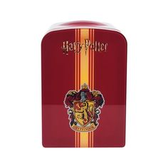 a harry potter lunch box with an emblem on the front and bottom, is shown