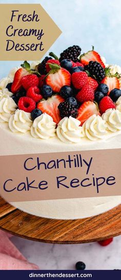 there is a cake with fruit on it and the words, fresh creamy dessert