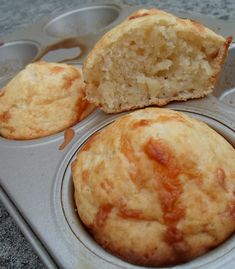 three muffins sitting in a muffin tin