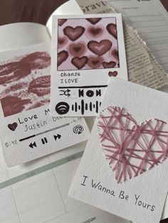 some cards that have been made to look like they are in the shape of a heart