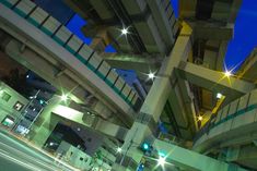 an overpass at night with street lights