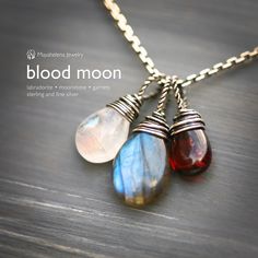 This is another take on my Blood Moon necklace, this time featuring three gemstones including blue glowing labradorite, golden light moonstone and blood red garnet. Hung on a cable chain and finished with my classic hook clasp. READY TO SHIP Please enter my main store at: ★ http://www.etsy.com/shop/mayahelena ★ Thanks for looking! Fusion Style Moonstone Jewelry Gift, Fusion Style Moonstone Jewelry For Gift, Moon Shaped Labradorite Jewelry For Gift, Blood Moon, Blood Red, Hook Clasp, Custom Bracelets, Moon Necklace, Red Garnet