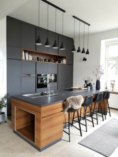 an image of a kitchen setting with bar stools