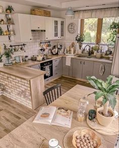 the kitchen is clean and ready to be used for cooking or dining room furniture arrangement