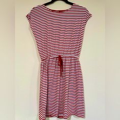 Perfect For Summer! Super Light And Casual Washed But Never Worn Red And White Striped T-Shirt Dress Roundneck Cap Sleeves Drawstring At The Waist Striped Pattern 100% Cotton Machine Wash Imported Size & Fit About 32" From Shoulder To Hem Open To Offers! Smoke And Pet Free Home Red Drawstring Dress For Spring, Red Spring Dress With Drawstring, Drawstring Dress, Striped T Shirt Dress, Drawstring Dresses, Striped T Shirt, Wearing Red, Size 6 Dress, Red And White Stripes