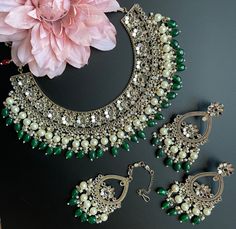 The perfect choker set with matching earrings and tikka for any sangeet/mehendi event! This gorgeous mirror work choker comes in beautiful bold and pastel colors to match with any outfit. The earrings and tikka are included as part of the set! Luxury Jewelry With Mirror Work For Festivals, Bangles Jewelry Designs, Mirror Work, Mirror Set, Traditional Jewelry, Wedding Jewelry Sets, Silver Mirrors, Indian Jewelry, Matching Earrings