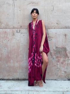 Shop our Fara Tie Dye Kaftan, this is a unique convertible dress perfect for any occasion. Its bold red magenta color is complemented by a boho vibes  that will make any outfit stand out without sacrificing comfort. Bohemian Hand-dyed Festival Dress, Summer Sleeveless Burgundy Maxi Dress, Sleeveless Burgundy Maxi Dress For Summer, Pink Batik Print Summer Dress, Hand Dyed Maxi Dress For Summer, Hand Dyed Maxi Length Summer Dresses, Hand Dyed Maxi Length Dresses For Summer, Burgundy Beach Dress For Summer, Bohemian Burgundy Summer Dress