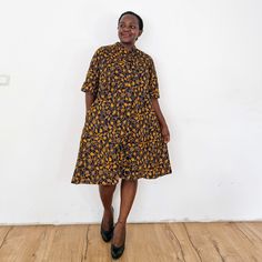 We love the speedwell dress :-) Our loose fit colourful dresses made out of non-stretchy African print are perfect for you in case you are looking for a style idea that is versatile, comfortable, and looks fabulous year-round. All materials used to design the dresses are sourced in Kenya.  MEASUREMENT GUIDE:  We recommend asking questions about sizes or you can take your own measurements (at the bust) if unsafe. Since its an A- Line, you only need to ensure that you have the right fit for the bu Printed Short Sleeve Midi Dress For Casual Occasions, Short Sleeve Floral Shirt Dress For Dress Down, Short Sleeve Shirt Dress With Floral Print, Short Sleeve Printed Dresses With Relaxed Fit, Printed Short Sleeve Relaxed Fit Dresses, Short Sleeve Printed Relaxed Fit Dresses, Short Sleeve Relaxed Fit Printed Dress, Relaxed Fit Short Sleeve Printed Dresses, Yellow Midi Dress With Pockets