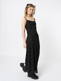 Shop our cami maxi dress in black. Featuring all over velvet floral print, a lace trim neckline, adjustable cami straps, mesh overlay and contrast lining in green. International shipping available and 15% off for students.