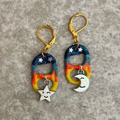 Love you to the moon and back! Enjoy your starry nights with these hand painted earrings featuring cute star and moon charms and lever back closures. You can see the optional matching bracelet here: https://www.etsy.com/listing/550839941/sun-and-moon-soda-pop-tab-bracelet-blue?ref=shop_home_active_22&sca=1 I use lever back closures on all my earrings because they close easily and are harder to accidentally lose. All items are handmade by me in my smoke free, pet friendly home, and available to s Tab Earrings, Soda Tab Crafts, Pop Tab Crafts, Pop Tabs, Celestial Blue, Yellow Glitter, Diy Crafts To Do, Moon And Star