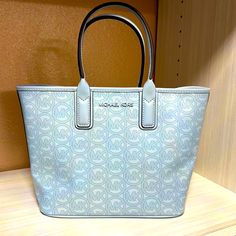 Michael Kors Jodie Small Logo Jacquard Small Tote Bag In Pale Ocean. Brand New With Tags Never Used In Perfect Condition . Smoke Free Home. Everyday Blue Bags With Logo, Elegant Blue Bag With Logo, Elegant Blue Bags With Logo, Medium Blue Shopping Bag, Blue Double Handle Shoulder Bag With Logo, Blue Shoulder Bag With Logo And Double Handles, Medium Blue Bag, Black Handbag Small, Michael Kors Clutch