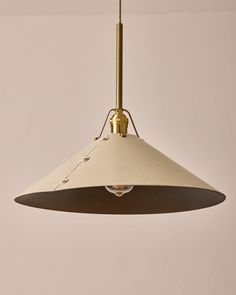 Robert True Ogden RTO Lighting - Extra Large Yaffa Pendant -Tumbled Brass Half Poles - Eggshell Leather Shade Natural Oak Canopy#leather-shade_eggshell-leather Leather Pendant Light, Ceiling Classic, Leather Pendant, Classic Table, Brass Accents, Satin Brass, Egg Shells, Brass Hardware, Lighting Collections