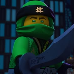 the lego ninja is holding a large knife