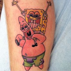 a cartoon character tattoo on the leg of a man's leg, with an image of spongebob